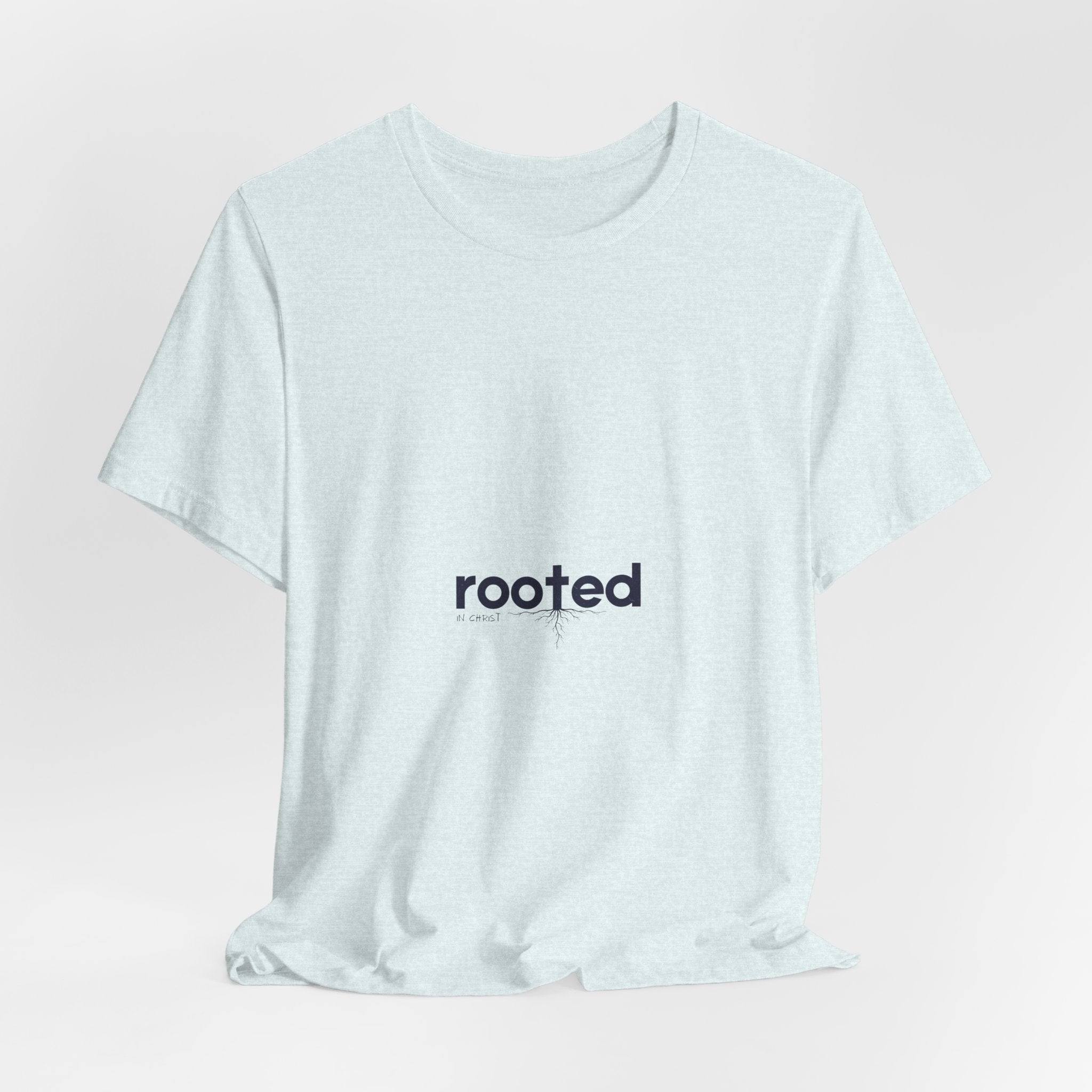 Rooted Minimalist Tee — 'rooted' Small Chest Graphic Cotton T-Shirt