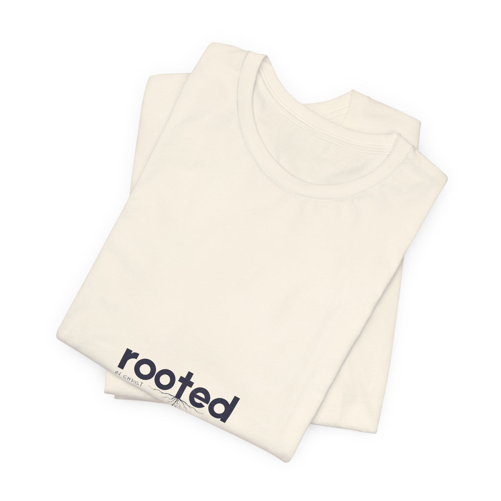 Rooted Minimalist Tee — 'rooted' Small Chest Graphic Cotton T-Shirt