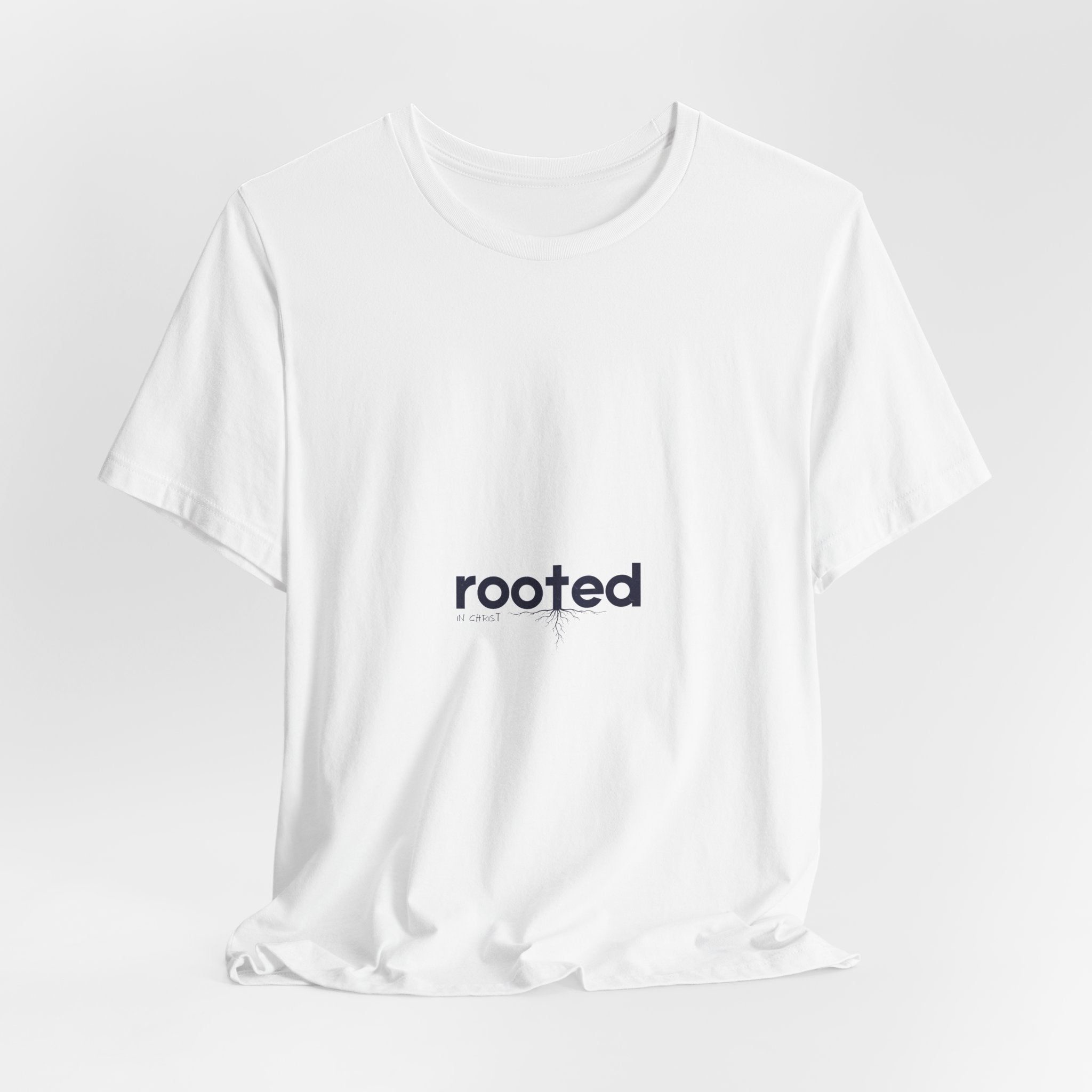 Rooted Minimalist Tee — 'rooted' Small Chest Graphic Cotton T-Shirt