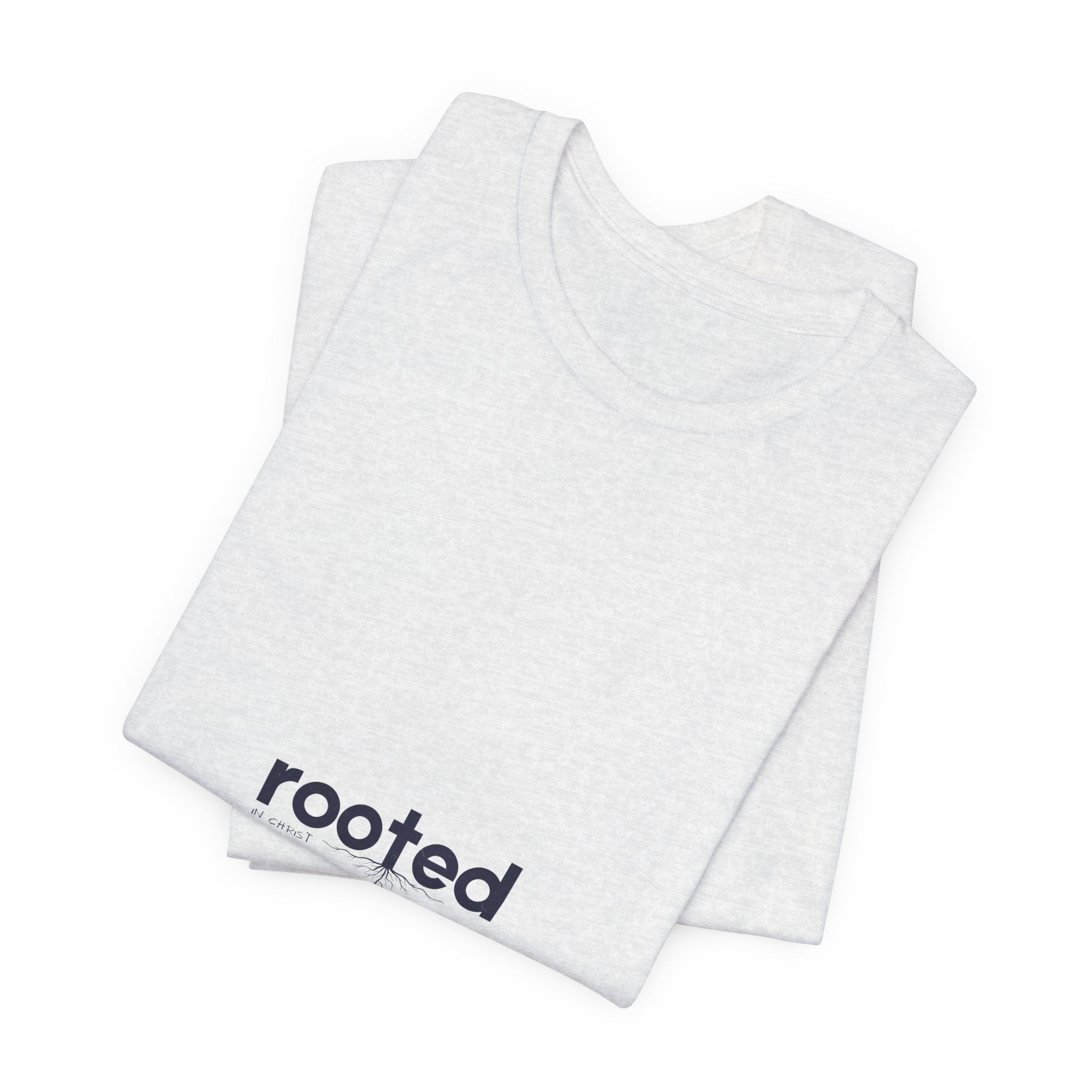 Rooted Minimalist Tee — 'rooted' Small Chest Graphic Cotton T-Shirt