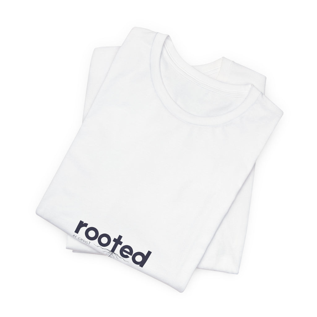 Rooted Minimalist Tee — 'rooted' Small Chest Graphic Cotton T-Shirt