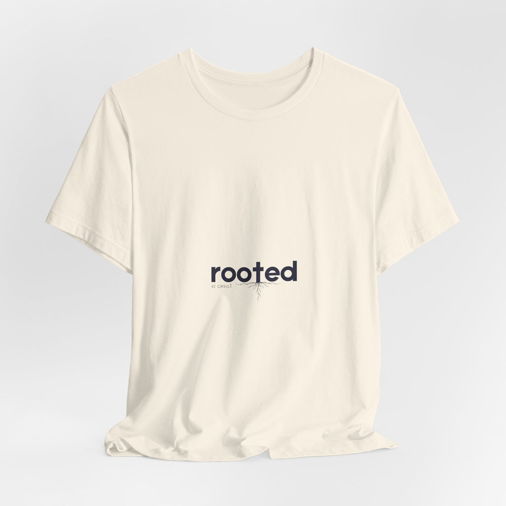 Rooted Minimalist Tee — 'rooted' Small Chest Graphic Cotton T-Shirt