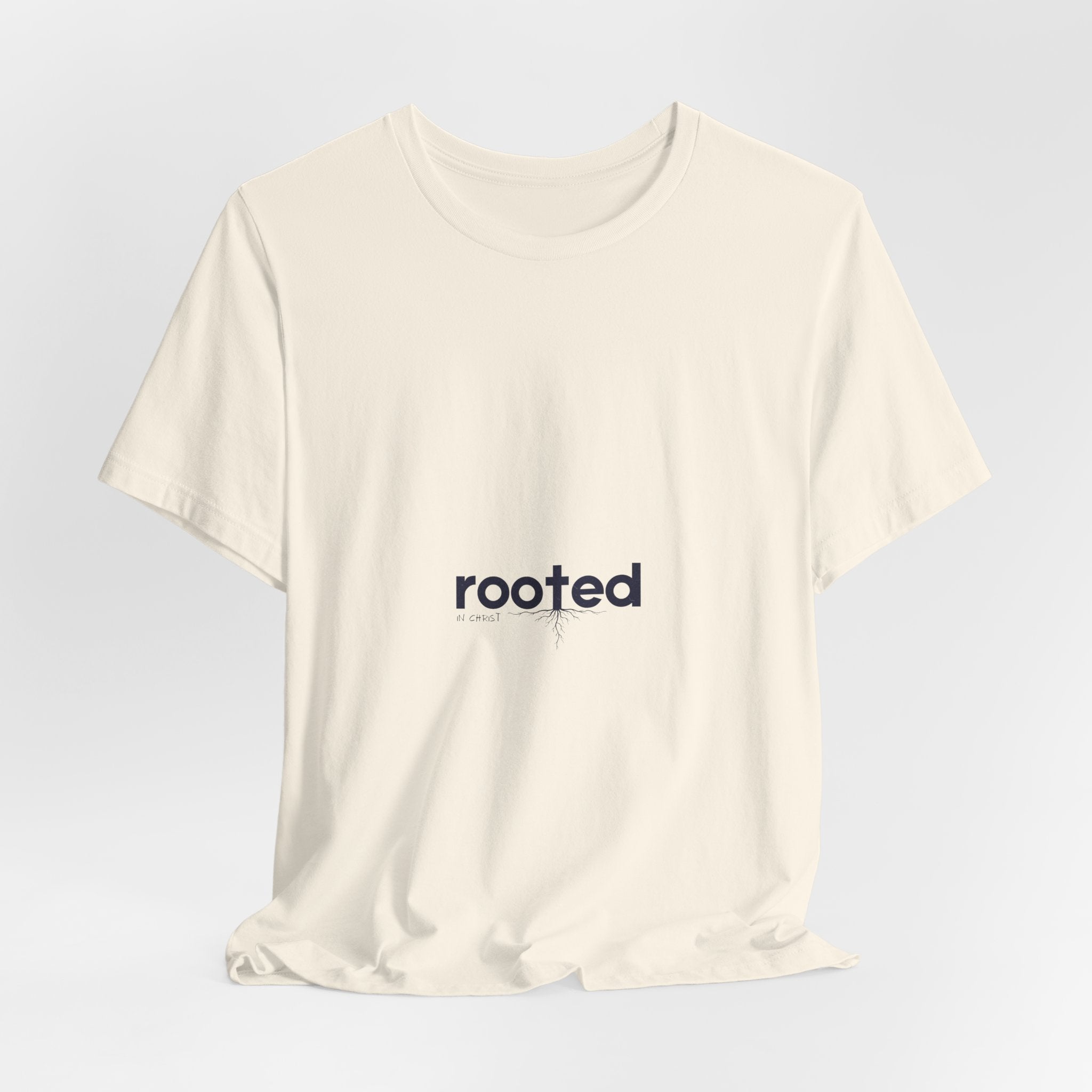Rooted Minimalist Tee — 'rooted' Small Chest Graphic Cotton T-Shirt